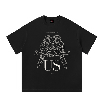 Us Lovebirds Tee in black, oversize cotton tee with hand-drawn lovebirds, front view
