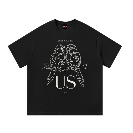 Us Lovebirds Tee in black, oversize cotton tee with hand-drawn lovebirds, front view